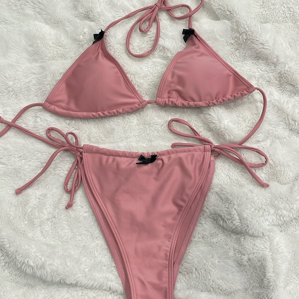 Pink bikini with black bows
